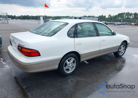 1999 Toyota Avalon Xls z USA, uszkodzony, nr VIN 4T1BF18B8XU335587